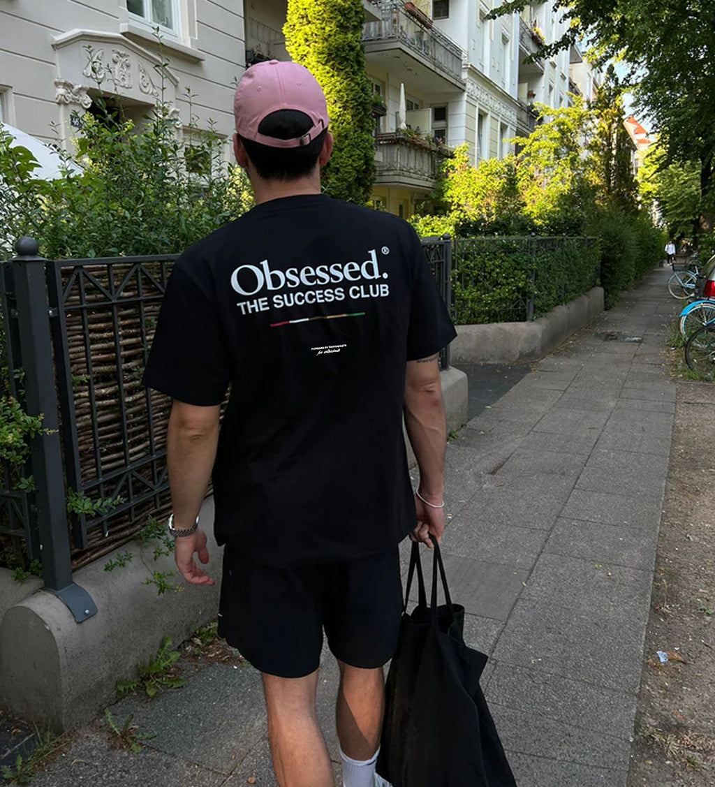 Oxvyn Oversized Obsessed T-Shirt in black, casual streetwear essential, front view